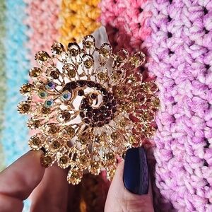 Elegant Gold and Brown Peacock Brooch